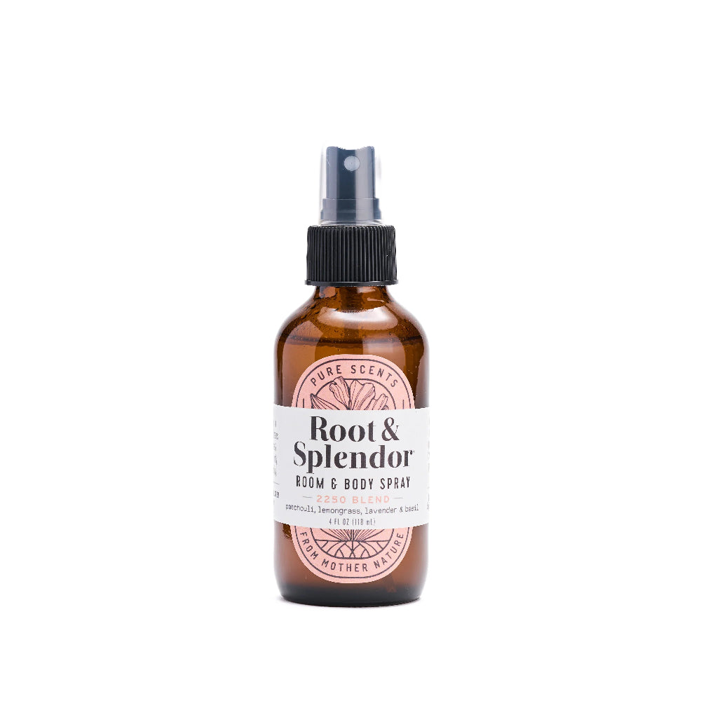 Brown spray bottle labeled 'Root & Splendor' on a white background