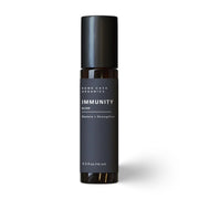 Rowe Casa Bottle of all-natural immunity blend product on a white background.