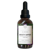 Bottle of anxiety support tincture with dropper on a white background
