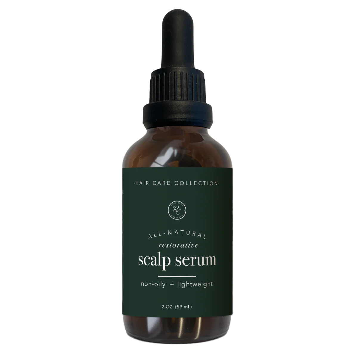 rowe casa Bottle of all-natural scalp serum with a dropper on a white background