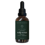 rowe casa Bottle of all-natural scalp serum with a dropper on a white background