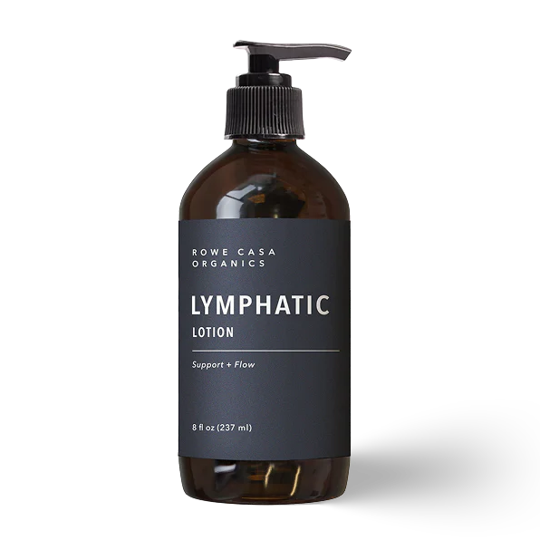 rowe casa Brown bottle of all-natural lymphatic lotion with a pump on a white background