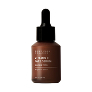 Brown bottle of Rowe Casa Organics Vitamin C Face Serum on a white background