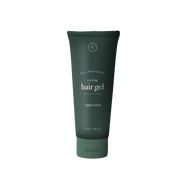 rowe casa Green tube of hair gel on a white background
