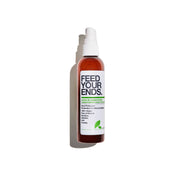 A bottle of Feed Your Ends Conditioner Spray on a white background with a soft shadow. The bottle is amber brown with a white spray cap and a white label featuring black and green text.