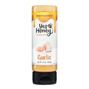 Yes Honey Garlic sauce bottle on a white background