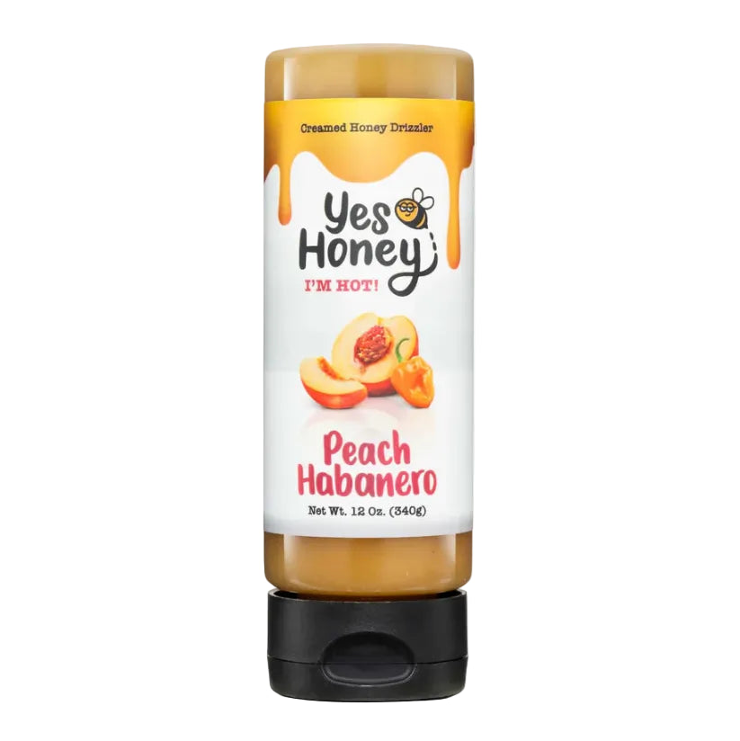 Yes Honey Peach Habanero sauce bottle on a white background